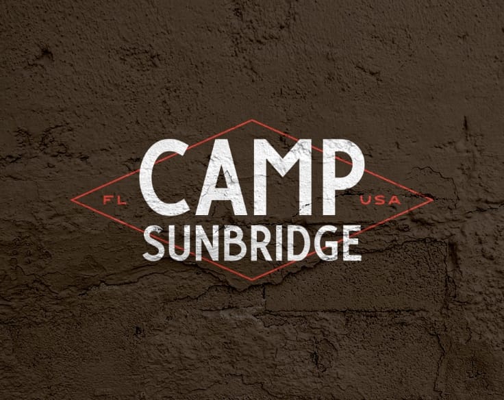 The Camp Sunbridge logo laid over a dark brown background
