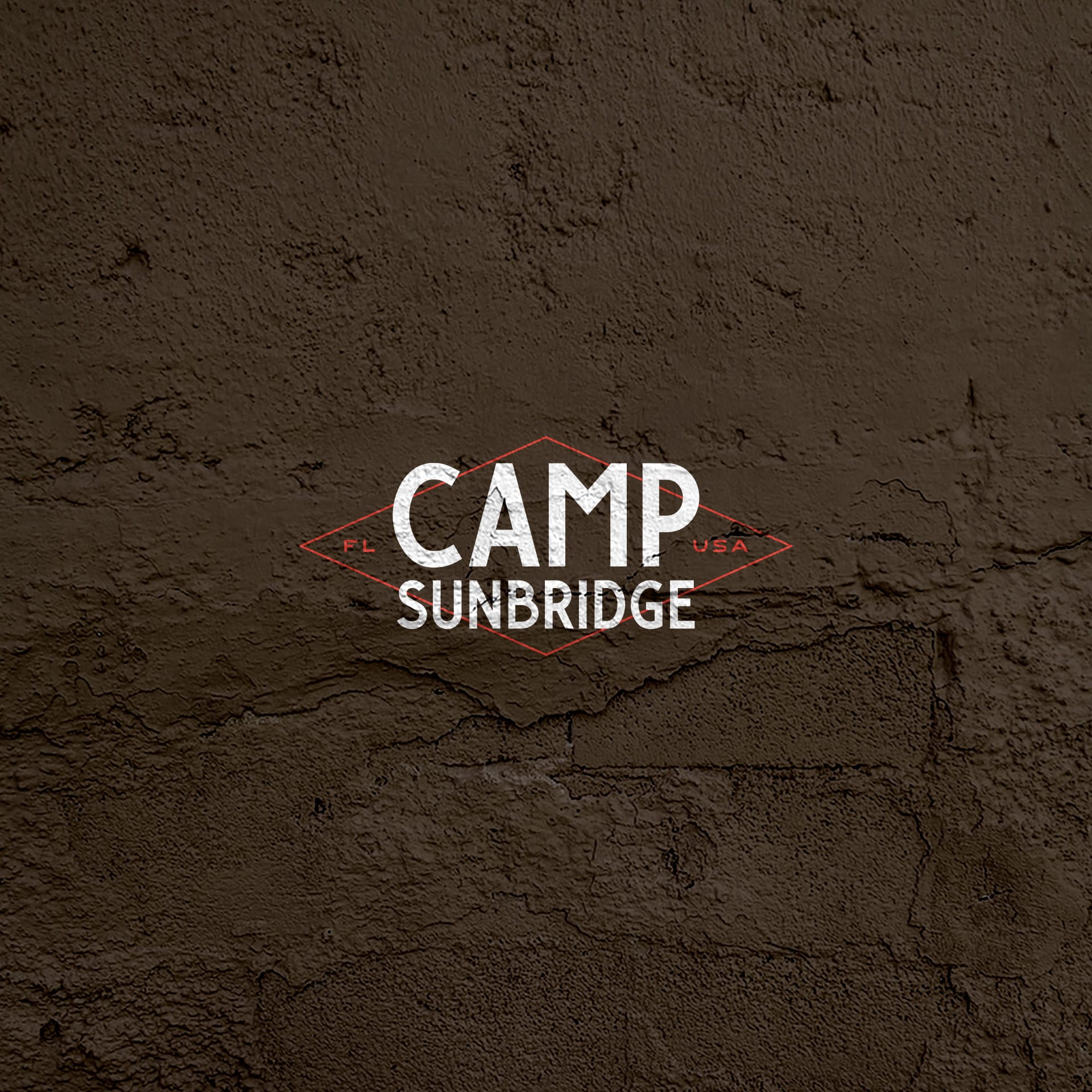 The Camp Sunbridge logo laid over a dark brown background