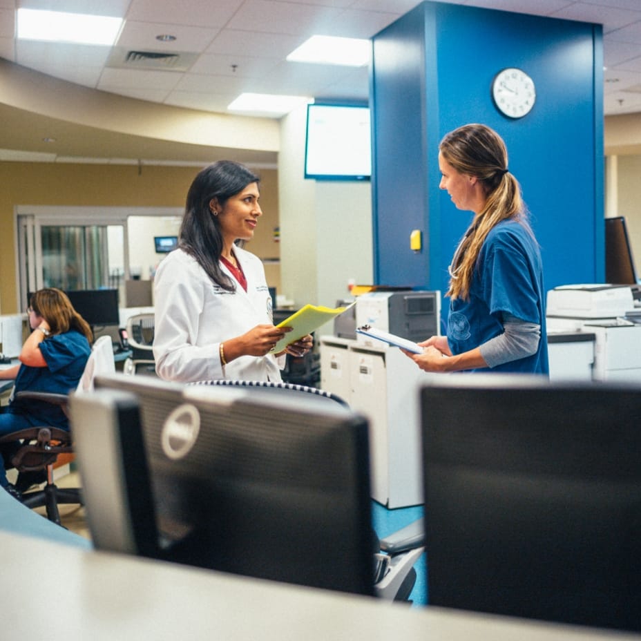 A doctor talking to a nurse in a hospital in Sunbridge community, St. Cloud, Florida in Metro Orlando