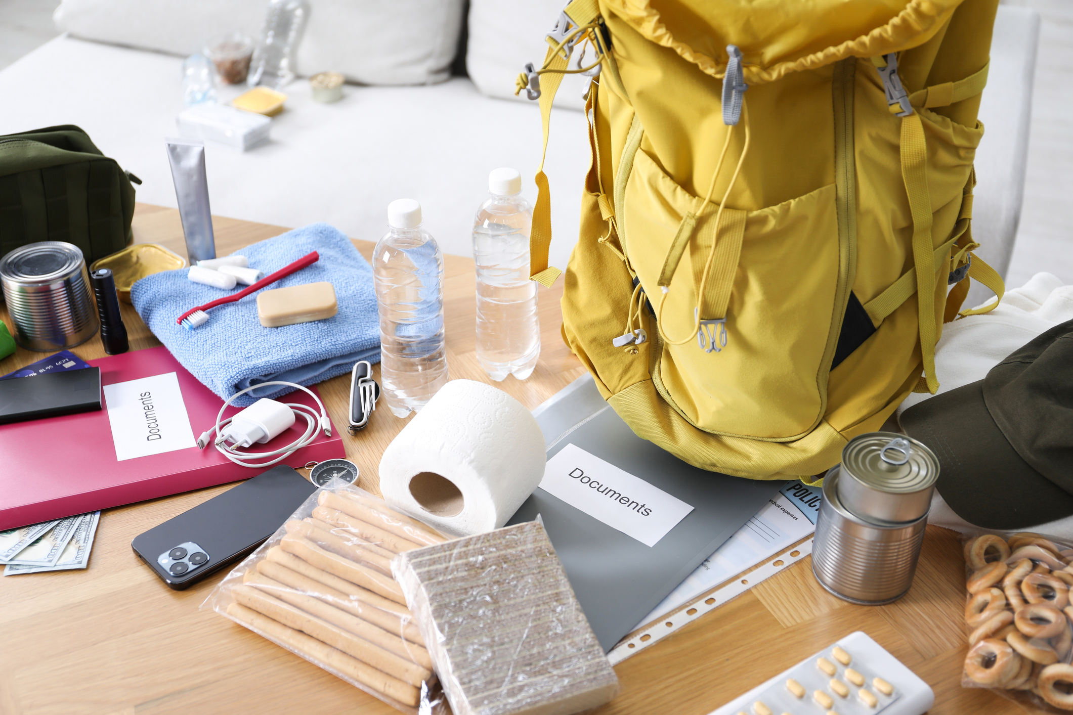 Emergency kit recommendations for hurricane preparedness: essential items for families to include food, water, medications, and supplies to ensure safety during storms and power outages